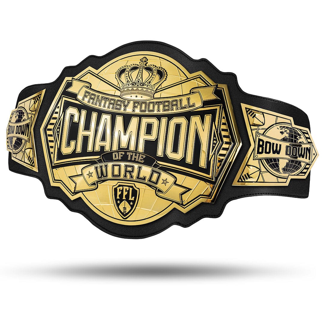 Gold and black fantasy football champion belt with "Champion of the World" and "Bow Down" inscriptions.